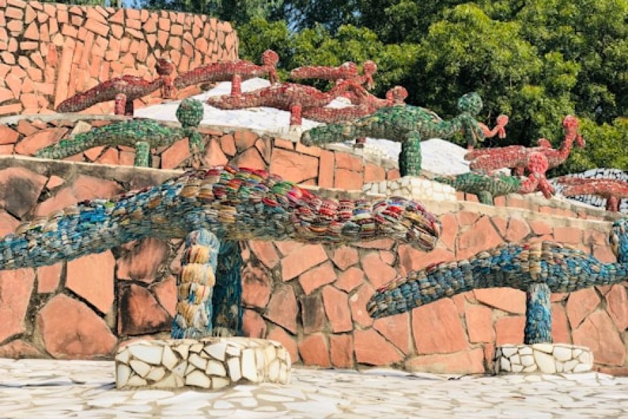 red and green trees on brown brick wall